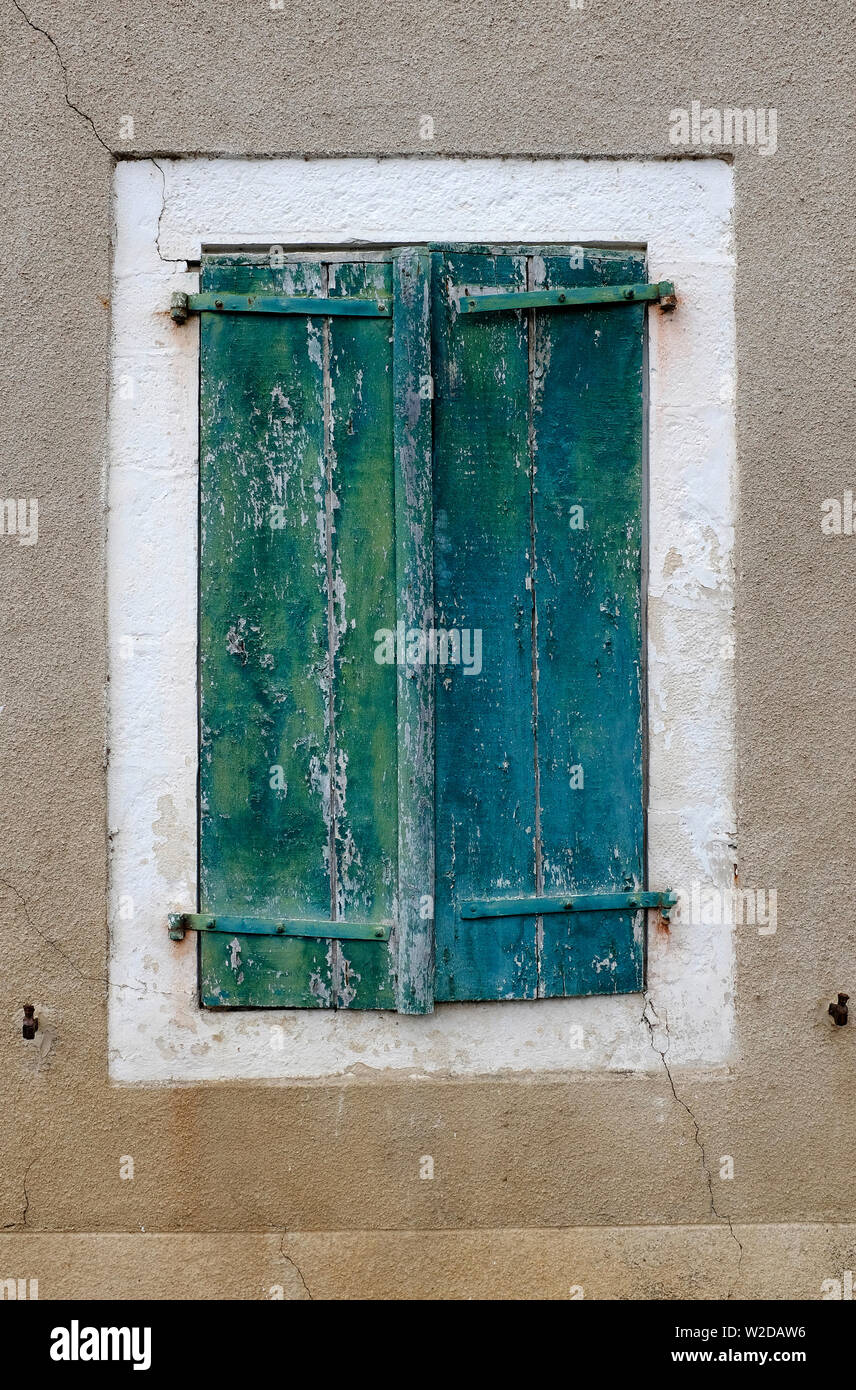 old painted green shutters on house, lot valley, france Stock Photo