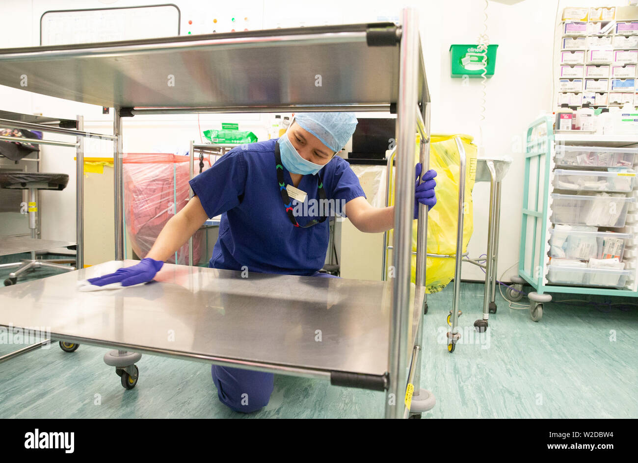 Nurse wiping down trolley hires stock photography and images Alamy