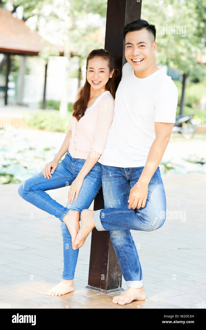 Portrait of Happy Couple Posing Together Standing with Arms Crossed Stock  Image - Image of adult, fashionable: 102698821