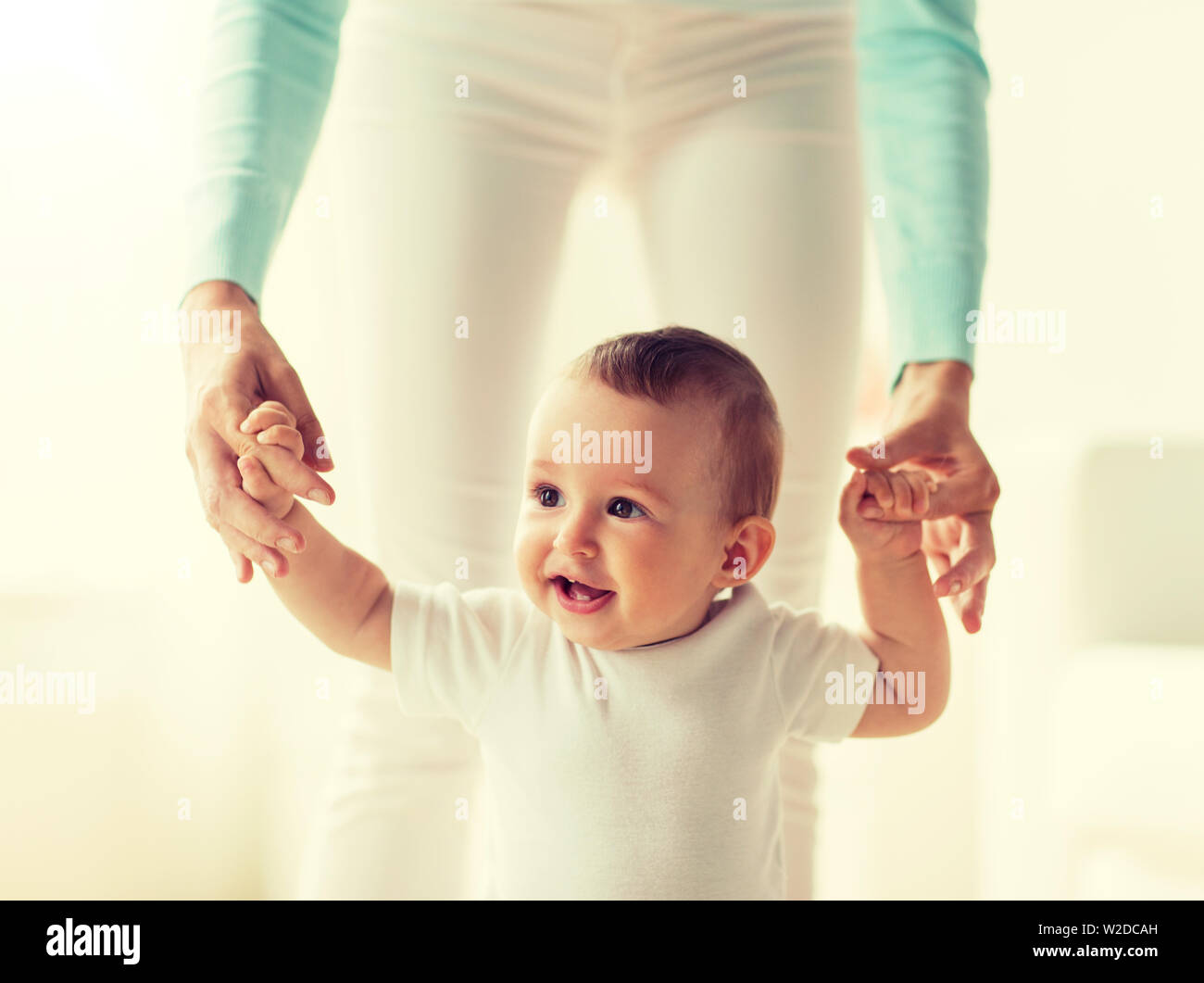 Baby toddling learning walk hi-res stock photography and images - Alamy