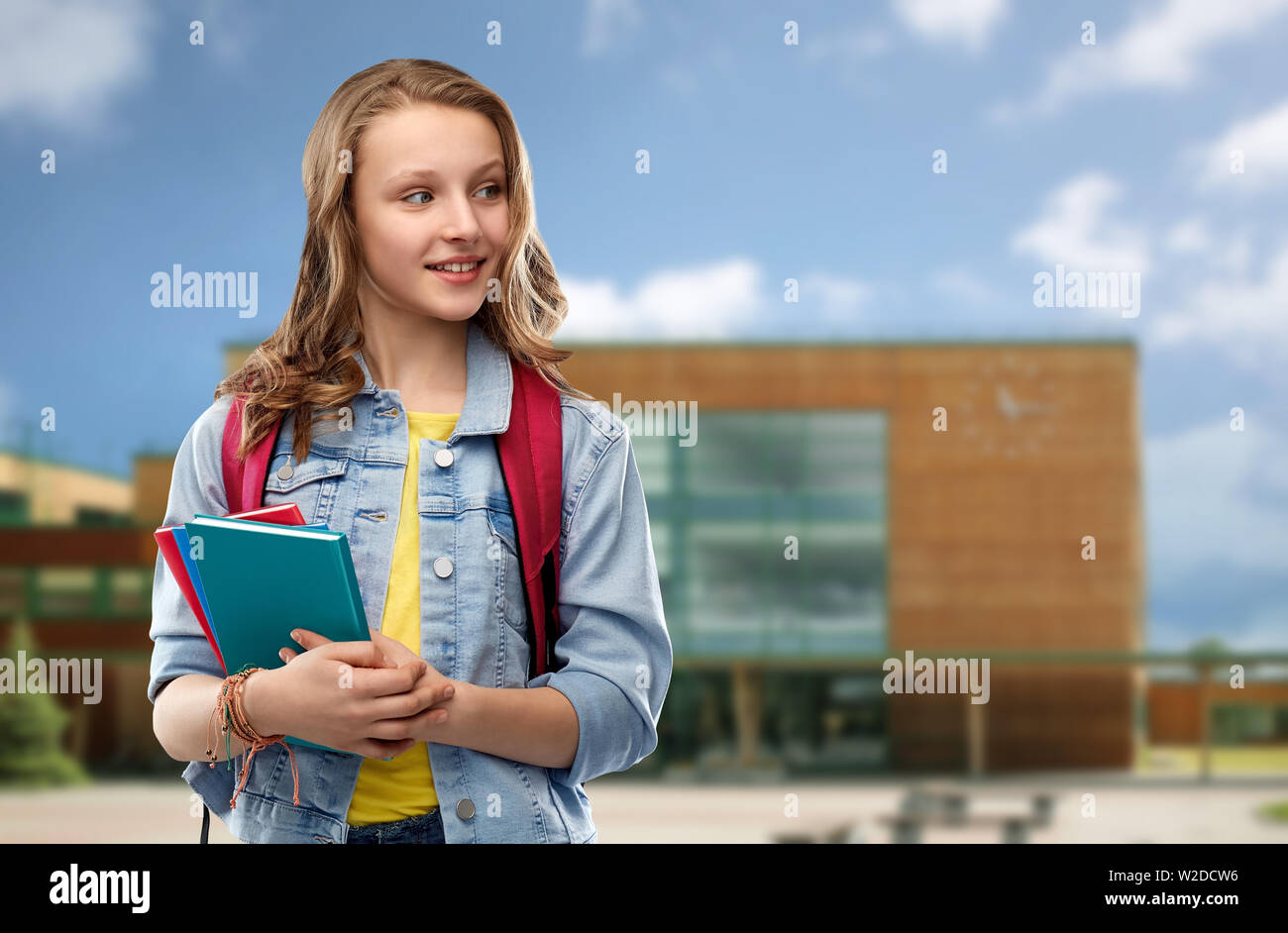 happy smiling teenage student girl with school bag Stock Photo - Alamy