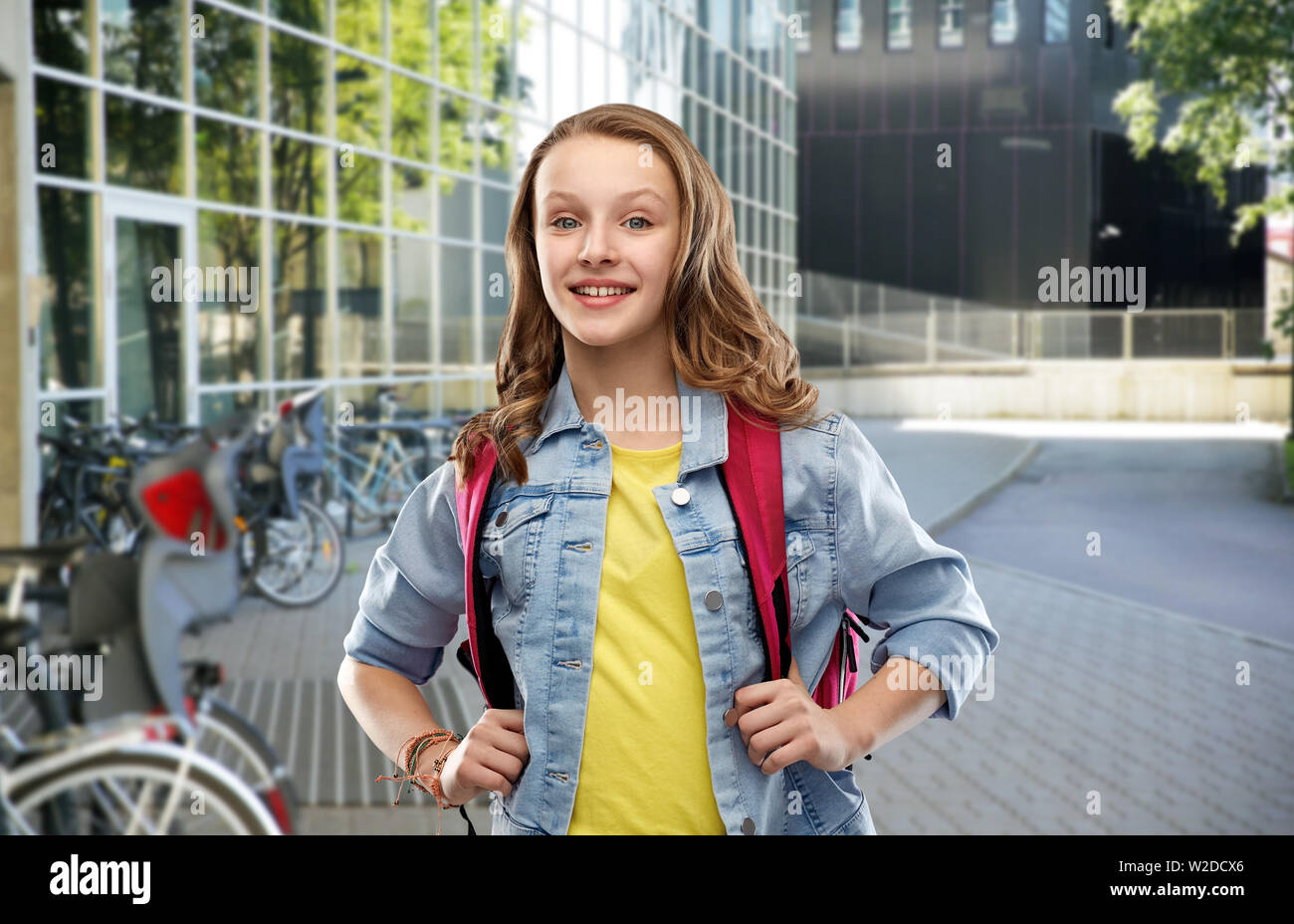 happy smiling teenage student girl with school bag Stock Photo - Alamy