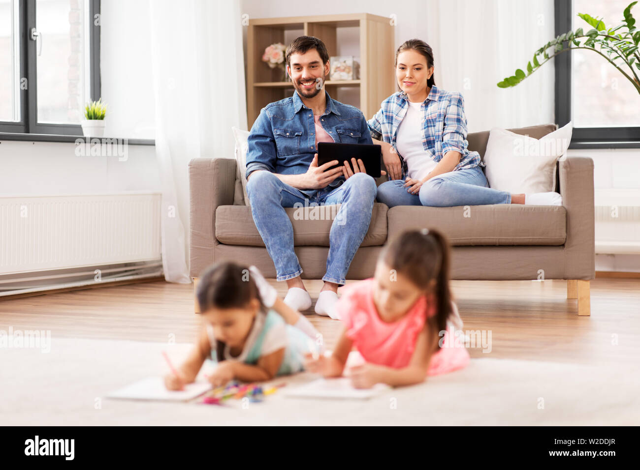 happy family spending free time at home Stock Photo