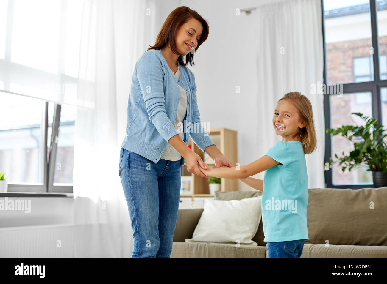 mother and daughter having fun at home Stock Photo Alamy