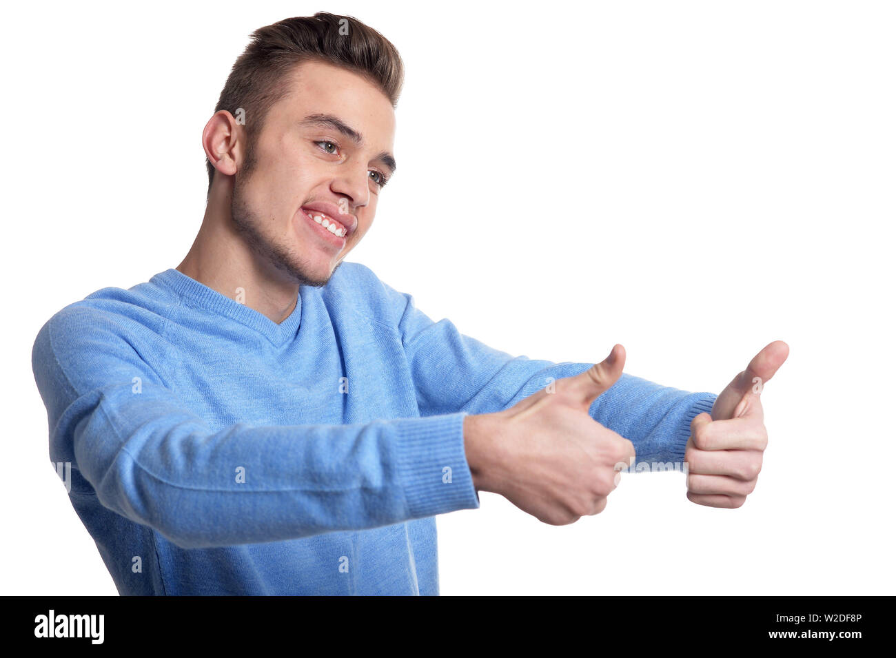 Portrait of handsome man thumbs up isolated Stock Photo