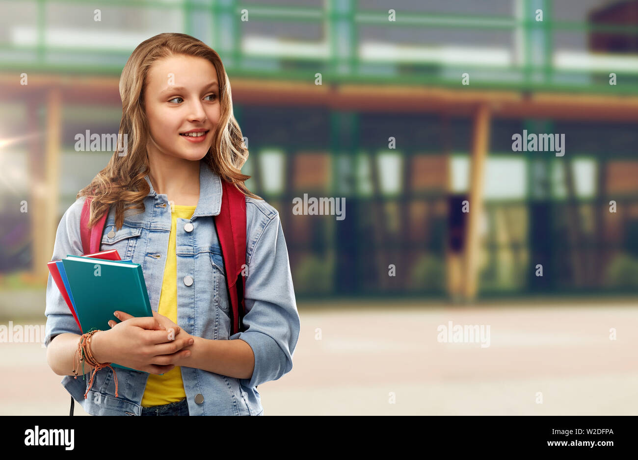 happy smiling teenage student girl with school bag Stock Photo - Alamy