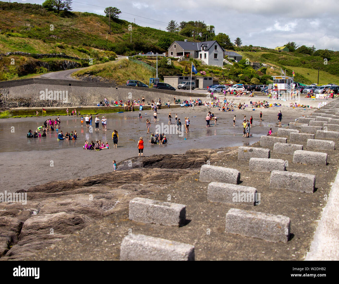 Tragumna, West Cork, Ireland, 8th July 2019, With temperatures in the mid twenty’s and children on holiday the families flocked to the beach at Tragumna. The beach has a blue flag for water quality and Life Guards keep the beach safe for swimmers.  Credit aphperspective/ Alamy Live News Stock Photo