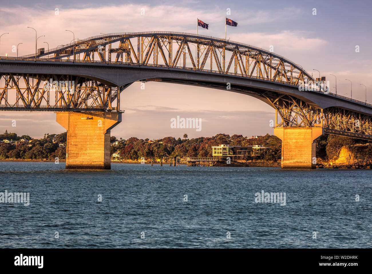Auckland Harbour Bridge at sunset Auckland, New Zealand. Stock Photo