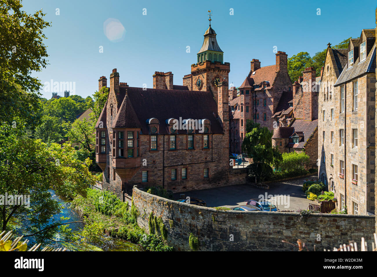 Iconic view in Dean Village,  on the Water of Leith in Edinburgh, Scotland. Well Court, designed by architect Sidney Mitchell in 1884 Stock Photo