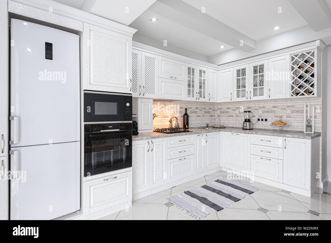 modern white wooden kitchen interior Stock Photo - Alamy