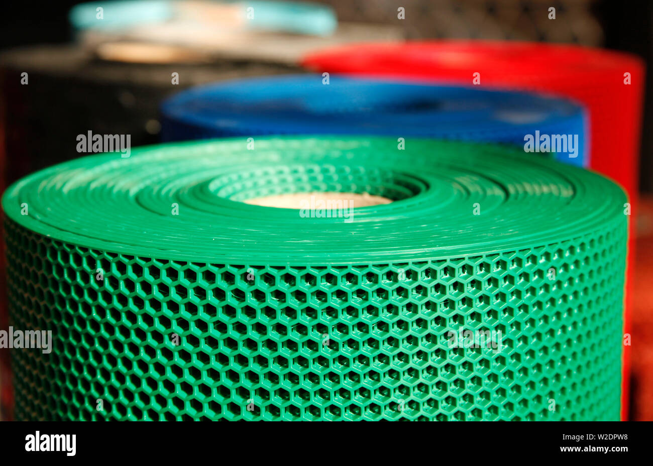 Colorful and perforated plastic grid Stock Photo Alamy