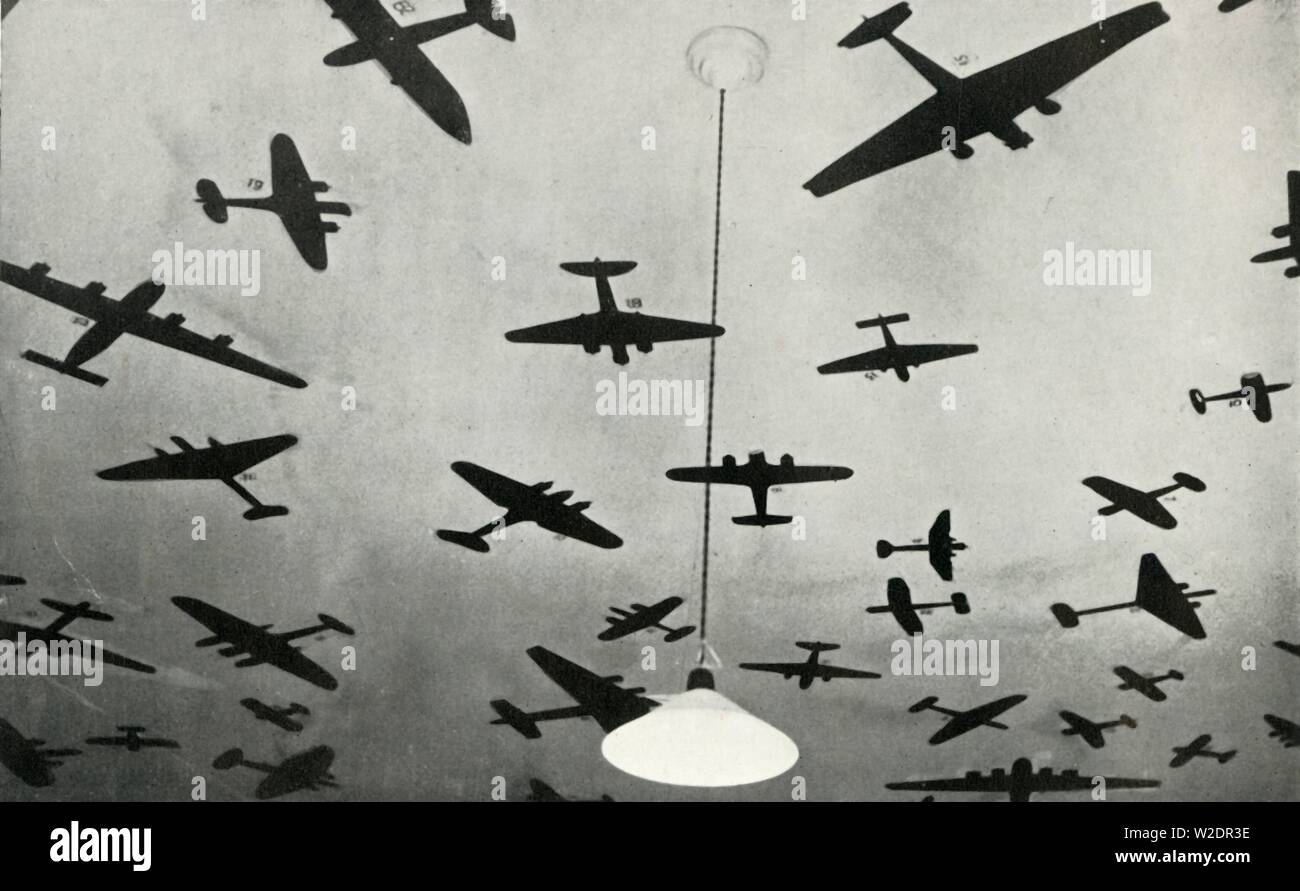 Silhouettes of military aircraft...at an RAF training school during the Second World War, 1941. Creator: Charles Brown. Stock Photo