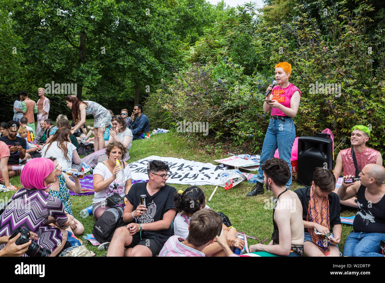 London, UK. 6 July, 2019. A speaker from Lesbians for Trans Rights addresses activists from Lesbians and Gays Support The Migrants, African Rainbow Fa Stock Photo