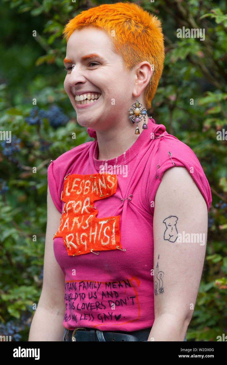 London, UK. 6 July, 2019. A speaker from Lesbians for Trans Rights addresses activists from Lesbians and Gays Support The Migrants, African Rainbow Fa Stock Photo