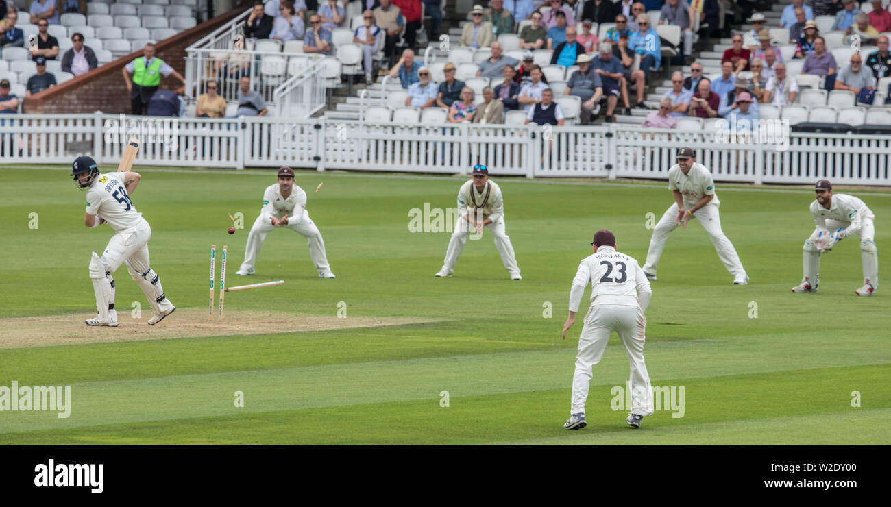 London, UK. 8 July, 2019. Sean Dickson picks the wrong one to leave and is bowled by Sam Curran as Surrey take on Kent on day two of the Specsavers County Championship game at the Oval. David Rowe/Alamy Live News Stock Photo