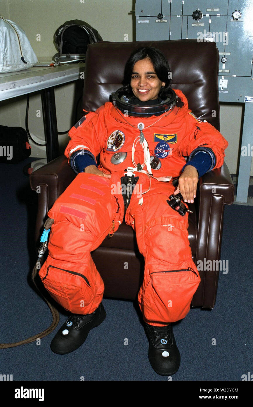 STS-87 Mission Specialist Kalpana Chawla, Ph.D., sits in her launch and entry suit in the Operations and Checkout Building before she and the five other crew members of STS-87 depart for Launch Pad 39B. There, the Space Shuttle Columbia awaits liftoff on a 16-day mission to perform microgravity and solar research. Born in Karnal, India, Dr. Chawla received her doctorate of philosophy in aerospace engineering from the University of Colorado in 1988. This is Chawla’s first mission for NASA Stock Photo