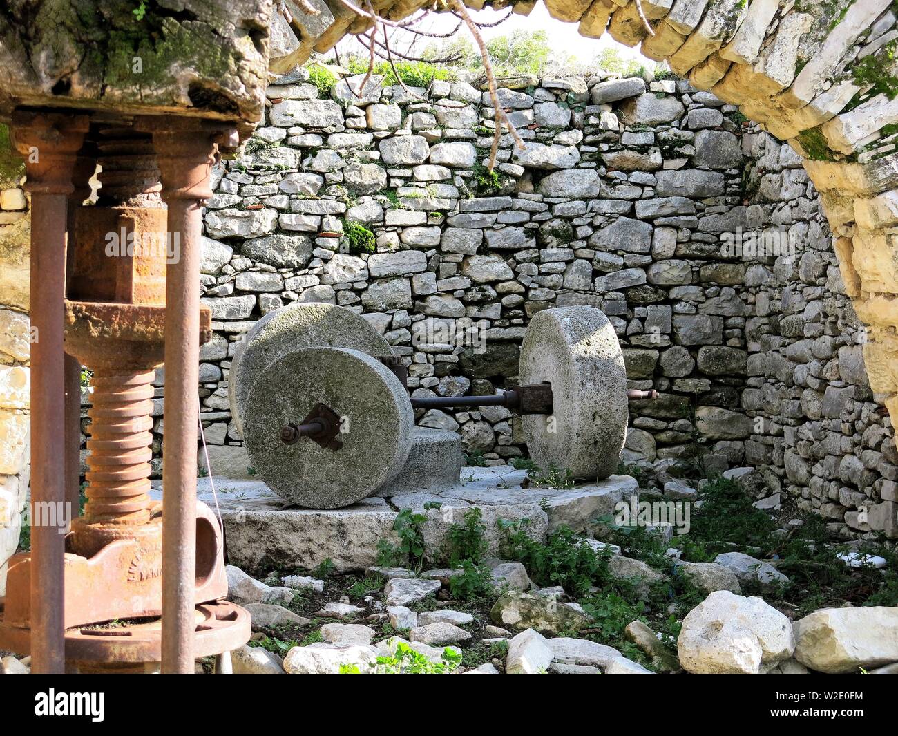 Antique olive press hi-res stock photography and images - Alamy