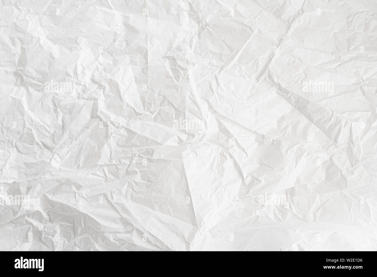 close-up shot of crumpled white wrapping paper background Stock Photo