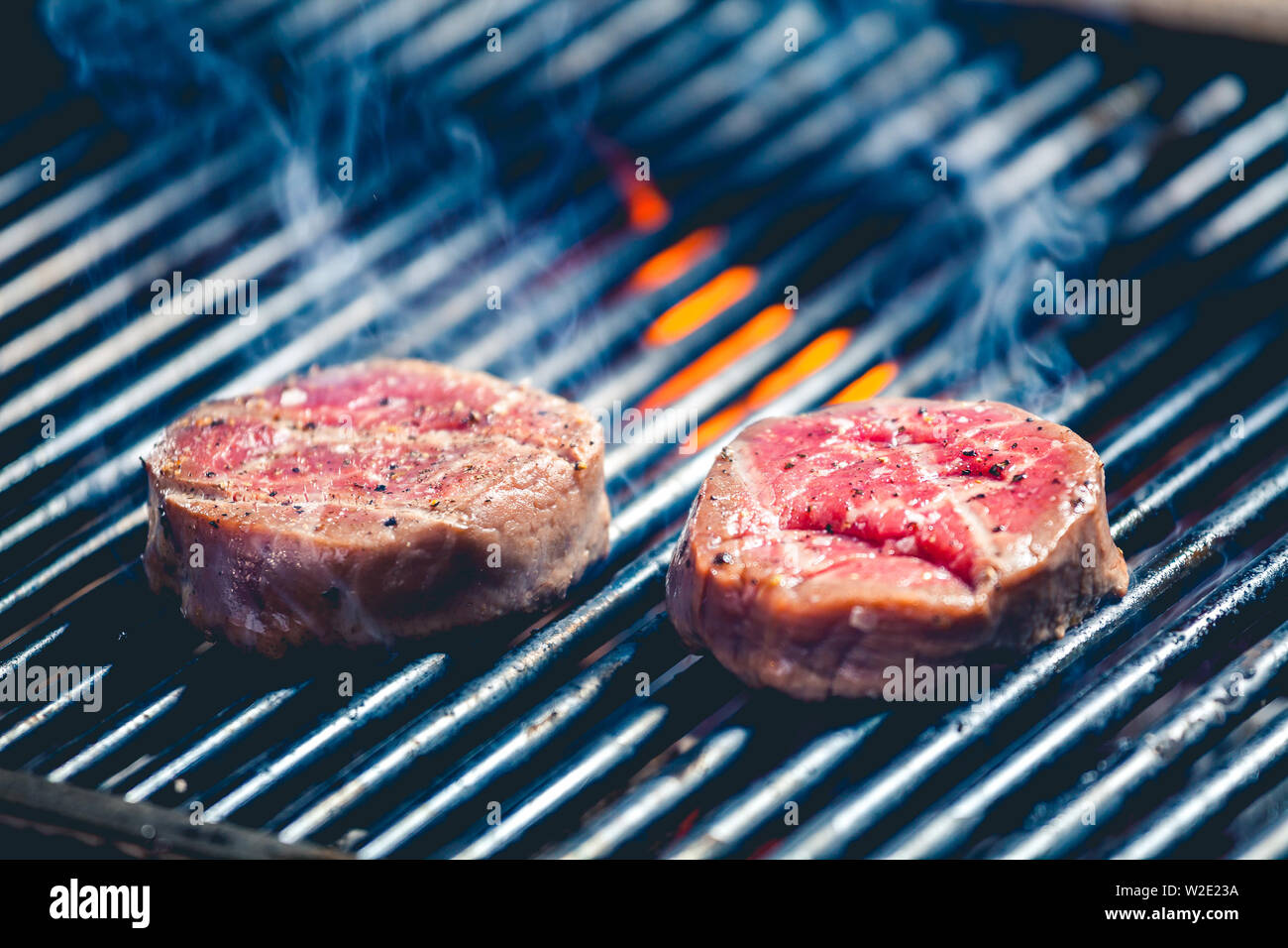 Delicious steak on the grill close up Stock Photo
