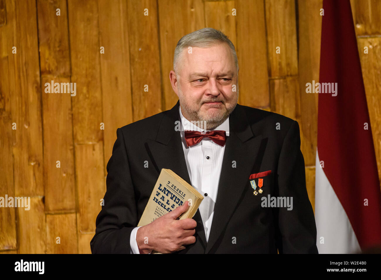 Riga, Latvia. 8th July 2019. Andris Vilks, director of Latvian National Library (LNB) with received book from President, during Reception in honour of the inauguration of President of Latvia Mr Egils Levits accompanied by First Lady of Latvia Mrs Andra Levite. Credit: Gints Ivuskans/Alamy Live News Stock Photo