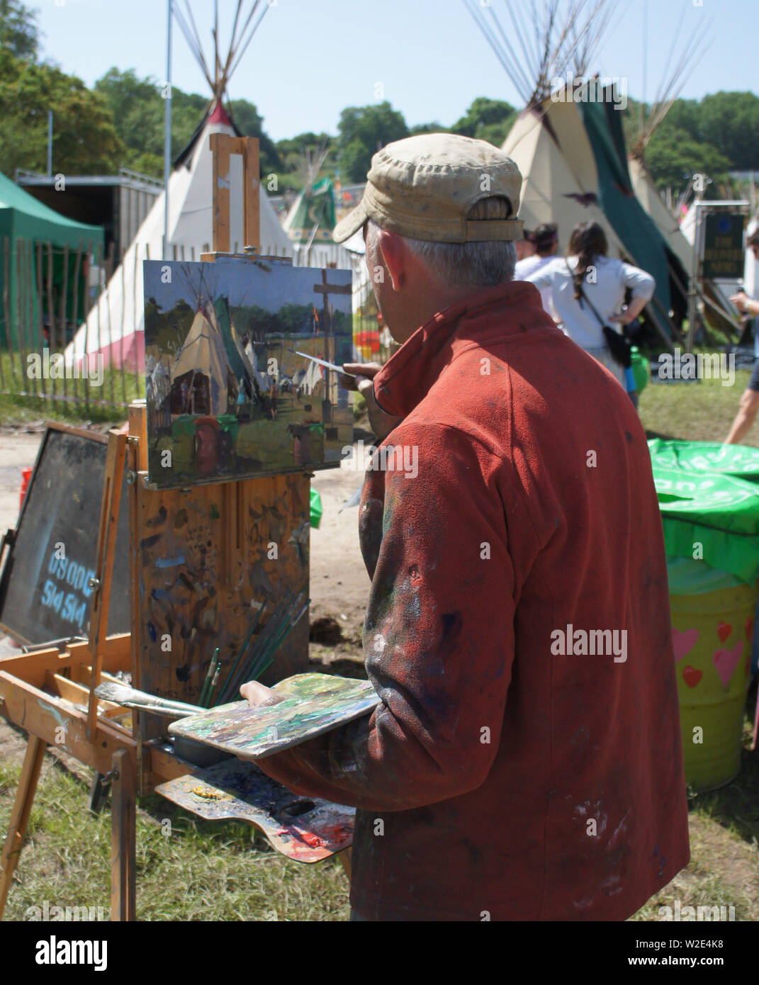 Artist painting at Glastonbury Festival 2019 Stock Photo