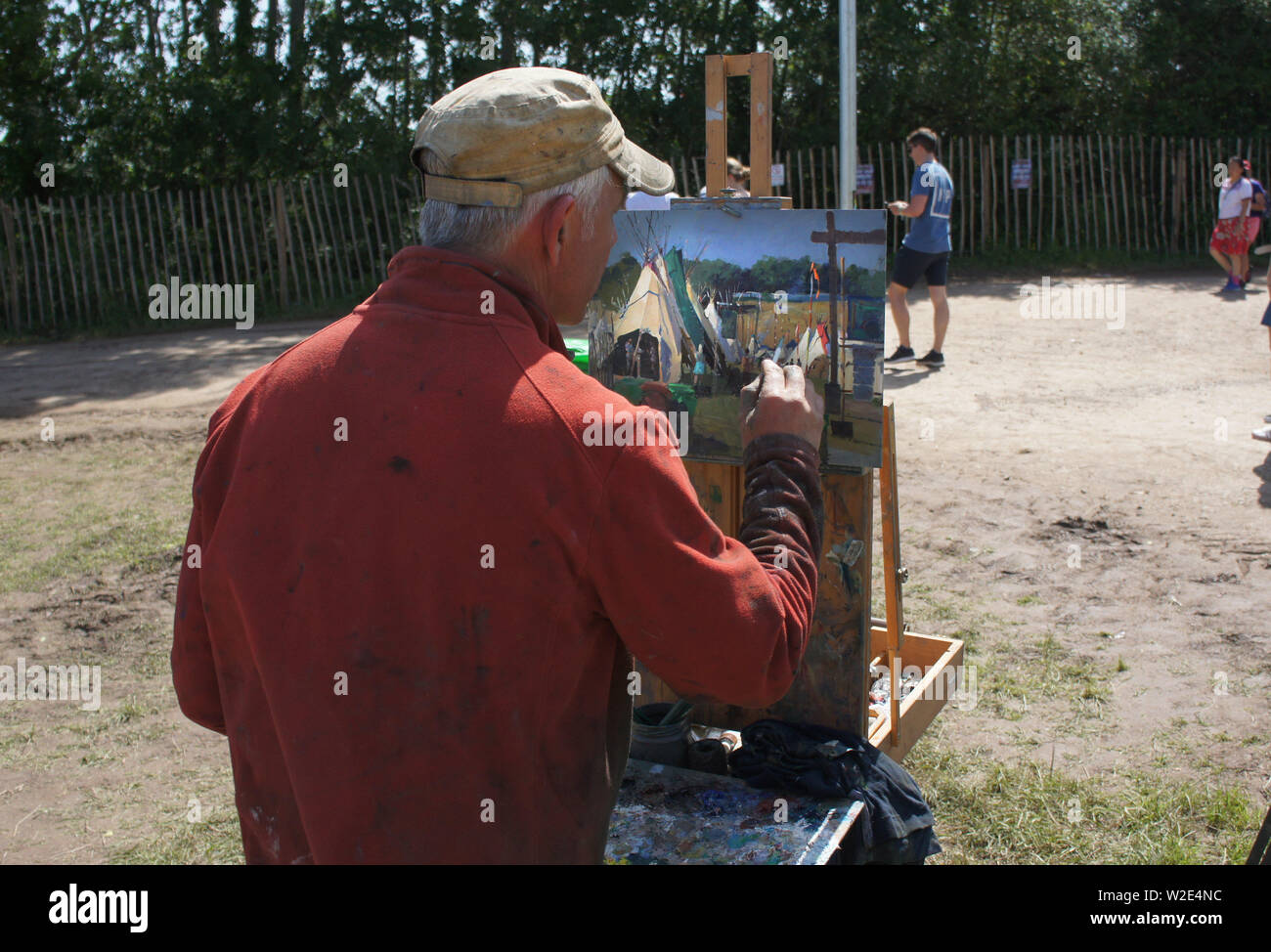 Artist painting at Glastonbury Festival 2019 Stock Photo