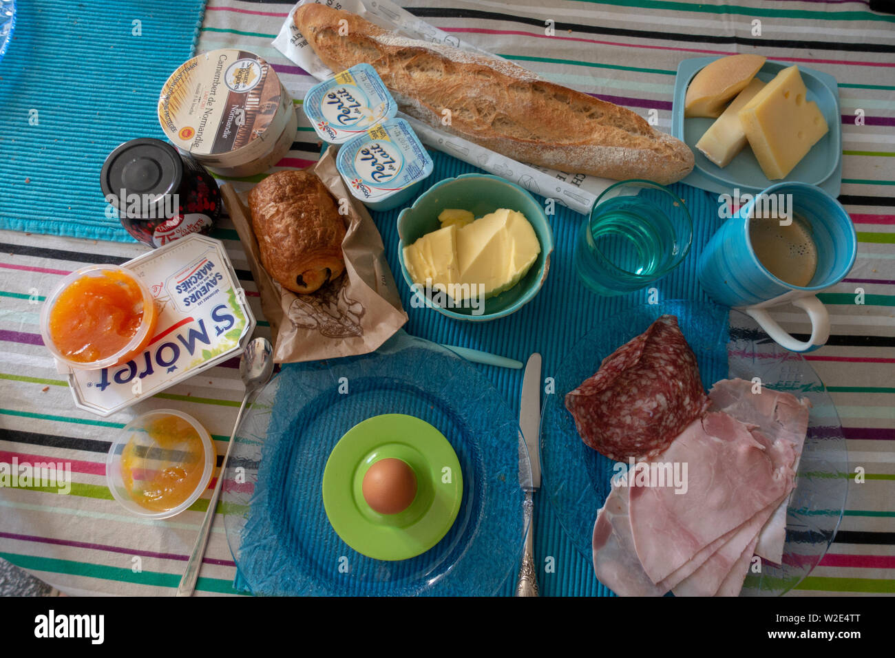 View from above of the many breakfast food choices laid at table breakfast setting Stock Photo