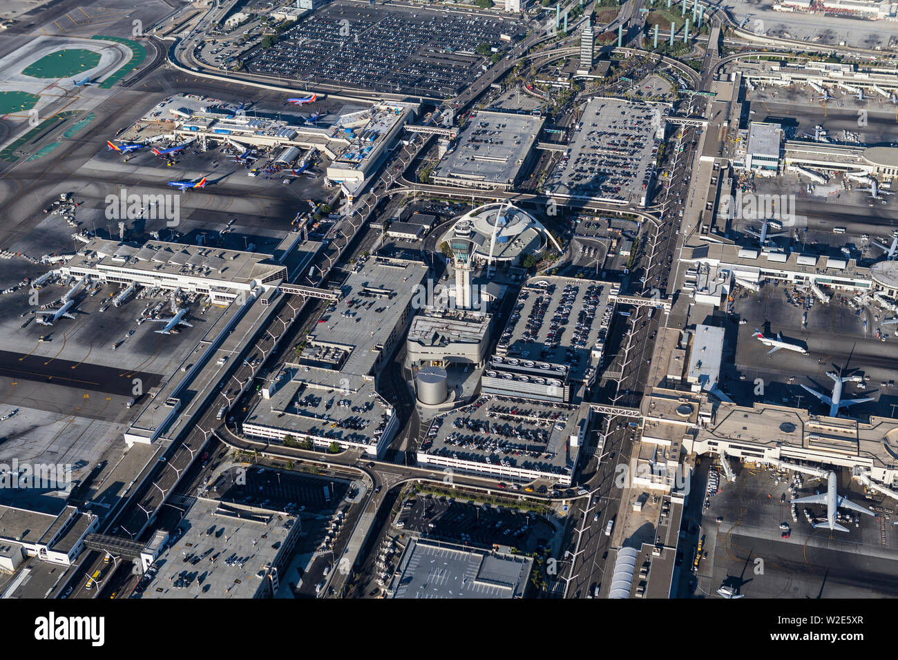 Los Angeles, California, USA - August 16, 2016:  Afternoon aerial view of roads, parking lots and terminals at LAX Airport in Southern California. Stock Photo