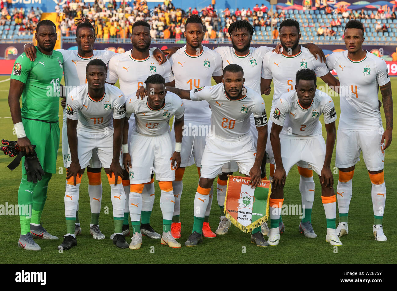 Suez, Egypt. 08th July, 2019. Soccer: Africa Cup, Mali - Ivory Coast, knockout round, round of 16: Ivory Coast players pose for the group photo. Credit: Oliver Weiken/dpa/Alamy Live News Stock Photo