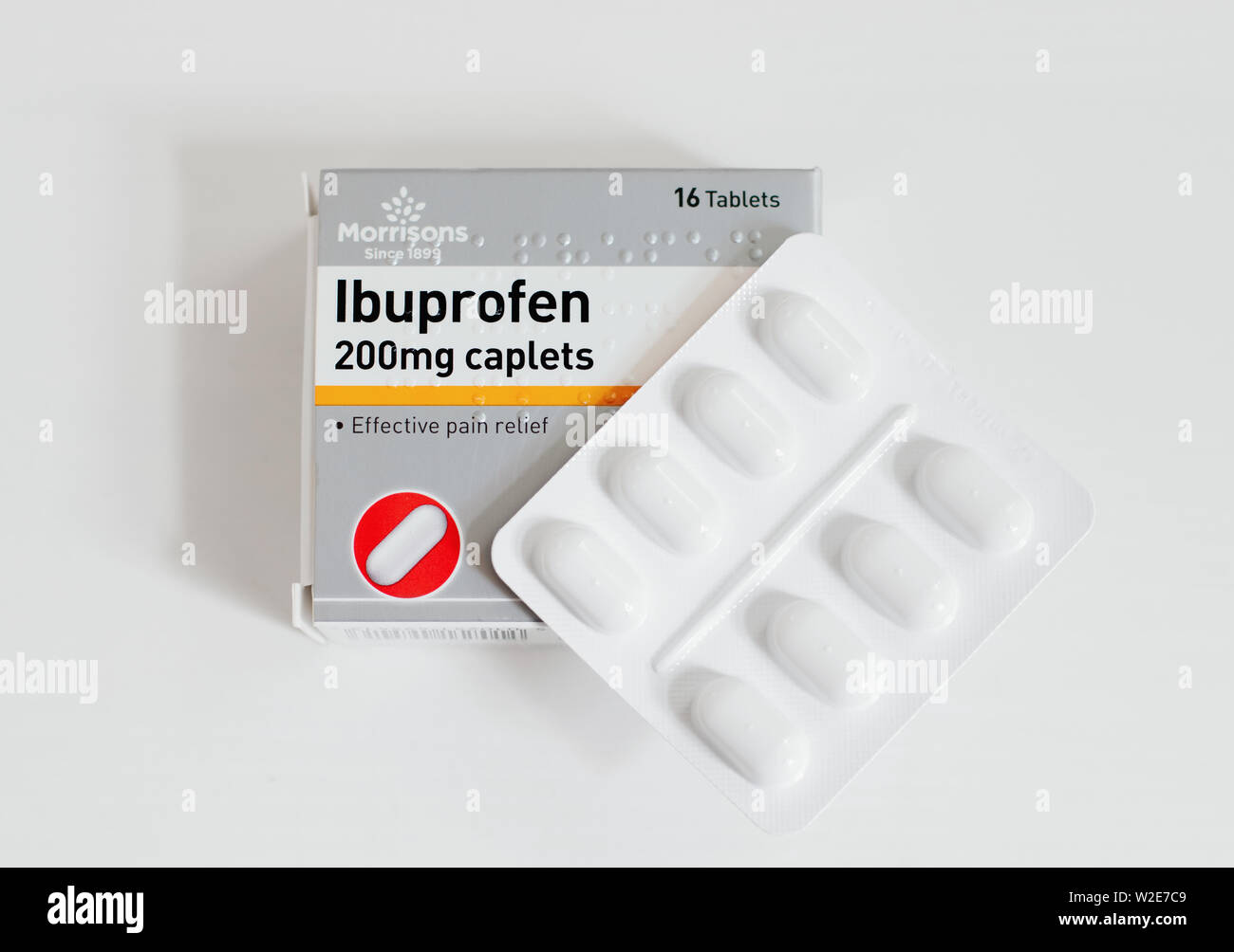 Packet of Ibuprofen painkillers, closeup with blister pack of tablets Stock Photo