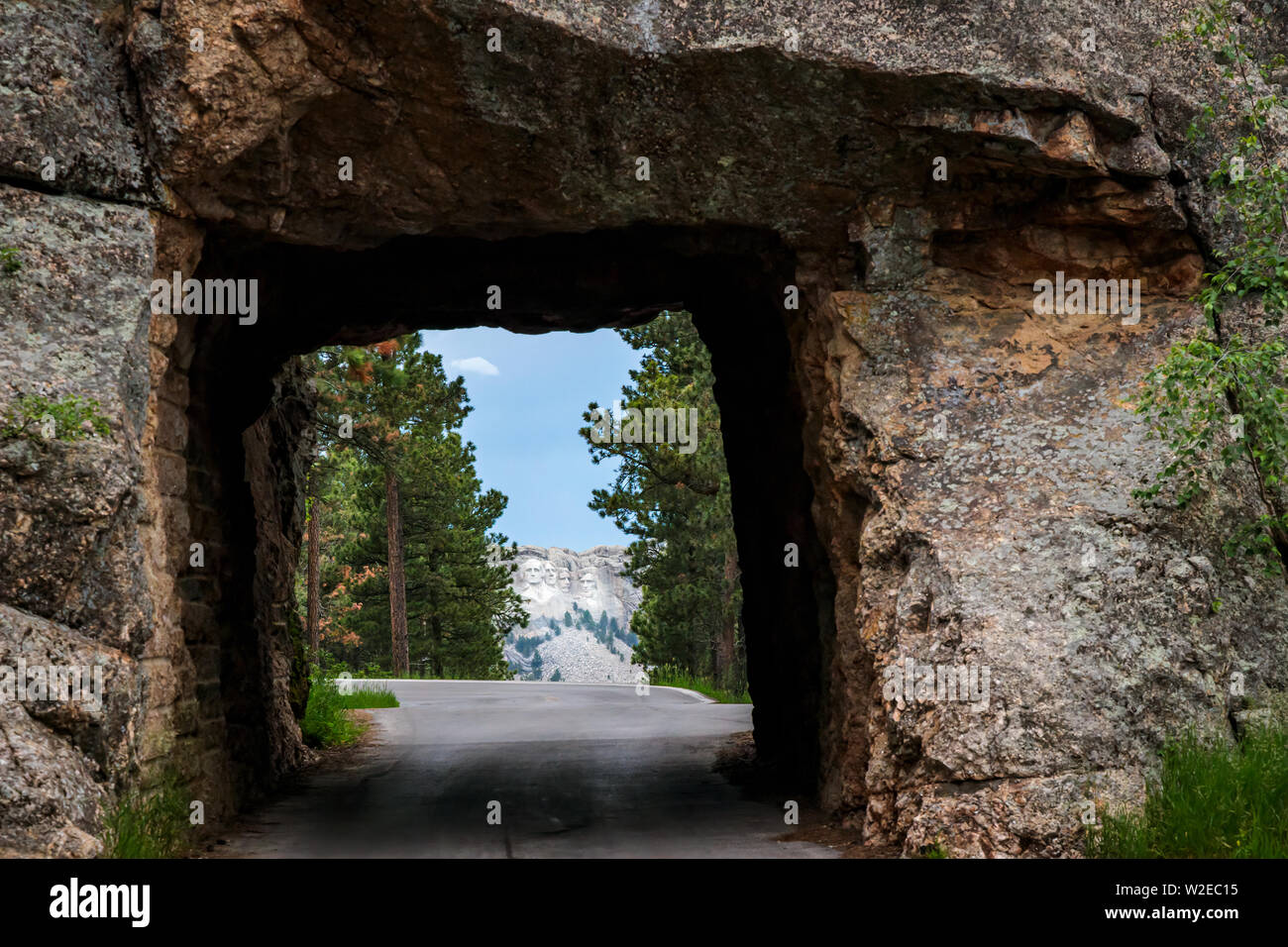 Mount Rushmore framed by tunnel on Iron Mountain Road in the Black