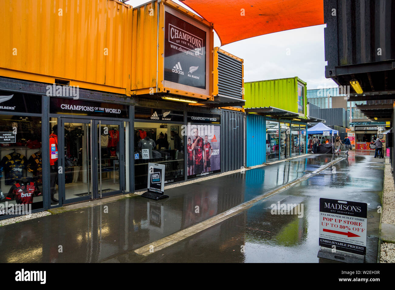 Street view of temporary brightly coloured container mall in