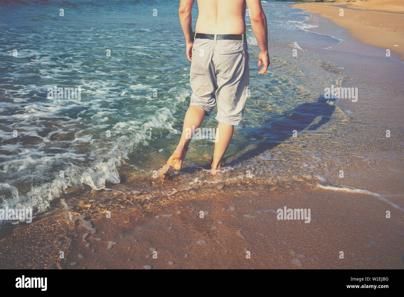 Barefoot at beach hi-res stock photography and images - Alamy