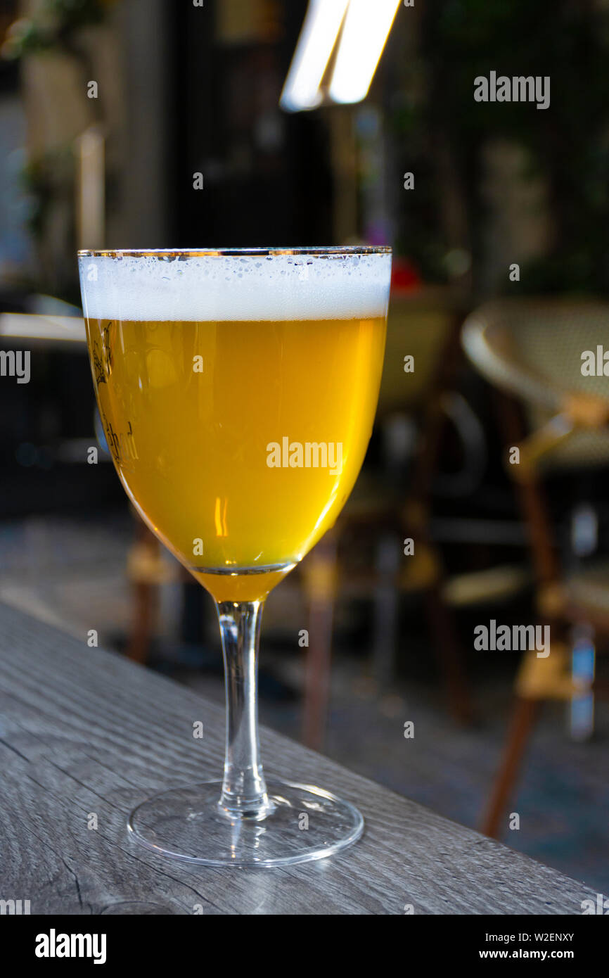 Famous Belgian beer served outside in small old cafe in special Belgian
