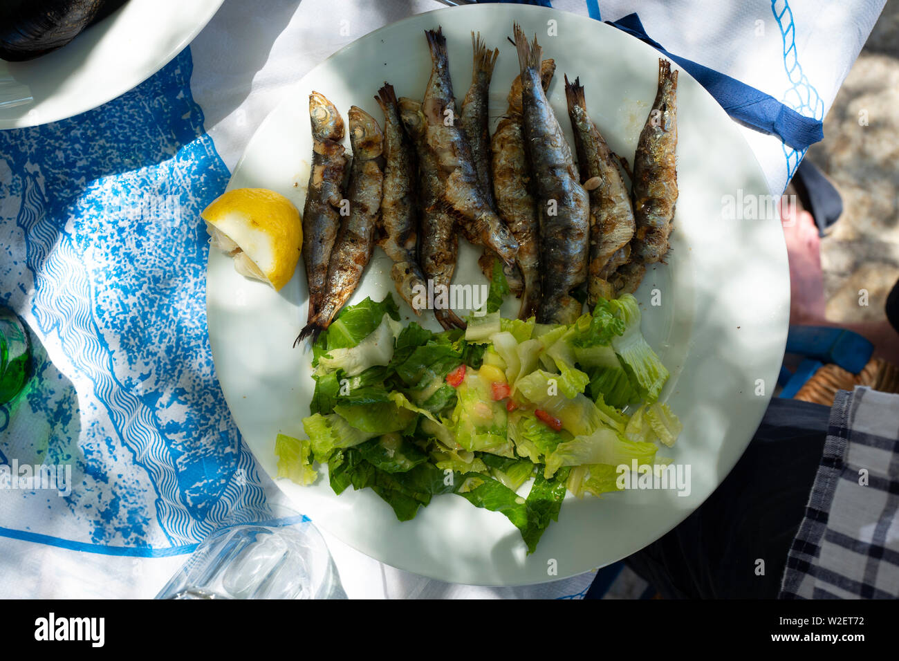 Grilled Sardines and Salad Lunch Dish Stock Photo Alamy