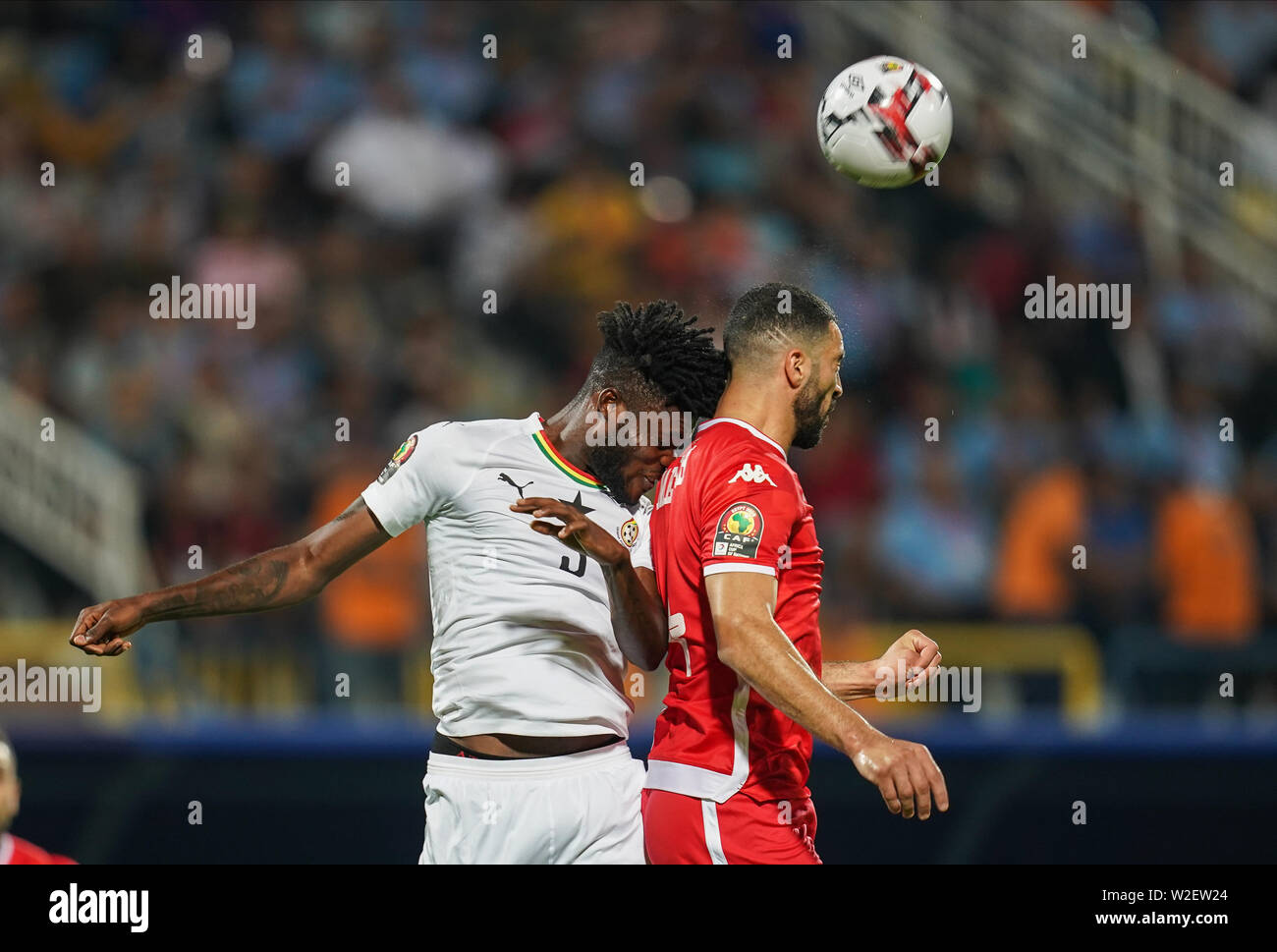 FRANCE OUT July 8, 2019: Thomas Teye Partey of Ghana and Yassine Meriah of Tunisia challenging for the ball during the 2019 African Cup of Nations match between Ghana and Tunisia at the Ismailia Stadium in Ismailia, Egypt. Ulrik Pedersen/CSM. Stock Photo