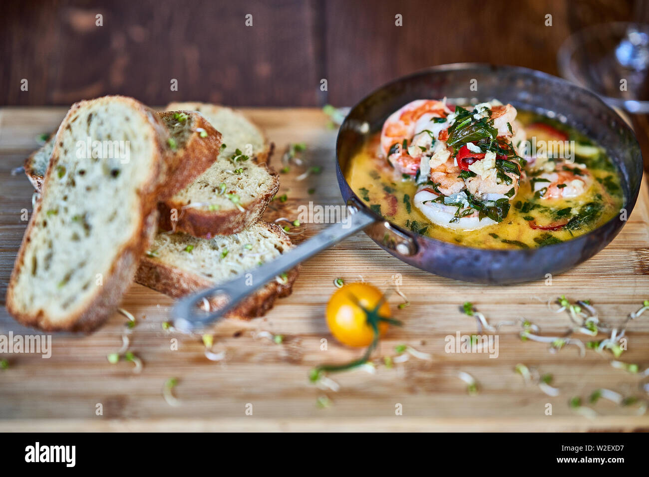 Spicy garlic chilli Prawns Shrimps on frying pan with lemon and