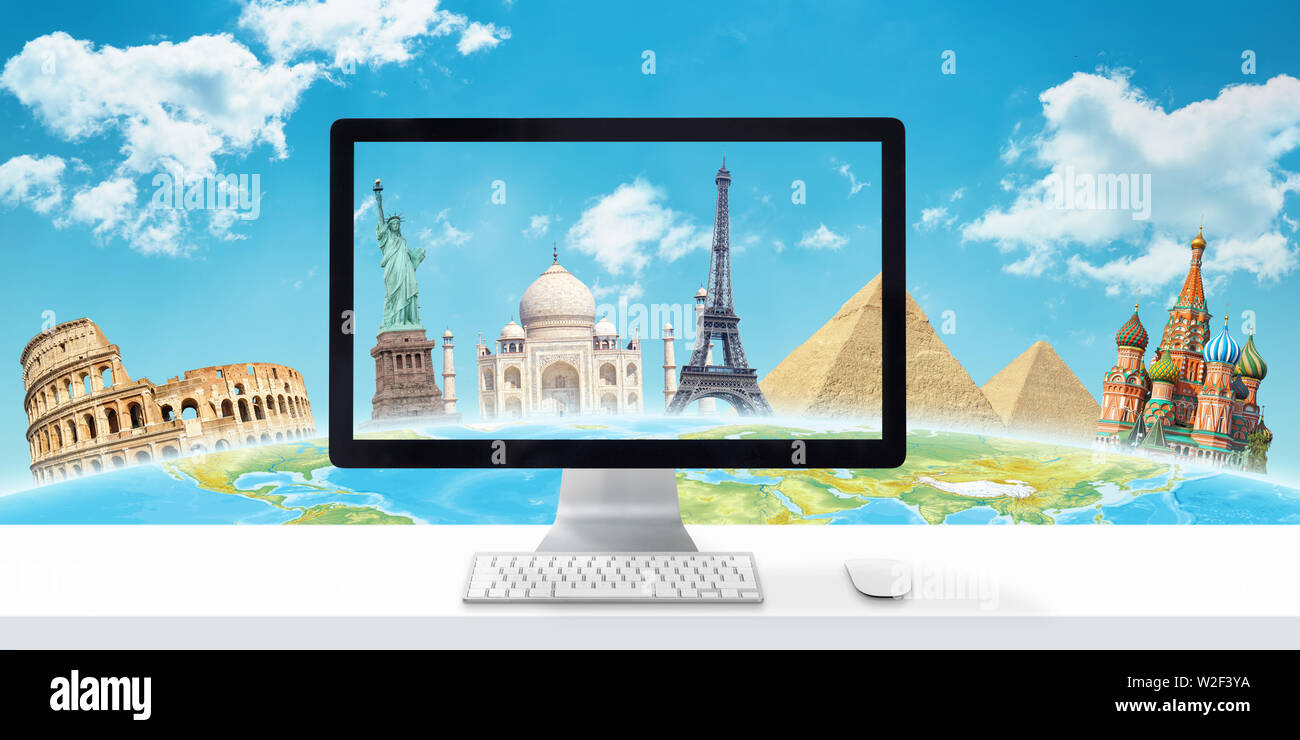 Desk with computer display and famous world tourist destinations in background. The concept of searching and planning travel through the Internet and Stock Photo