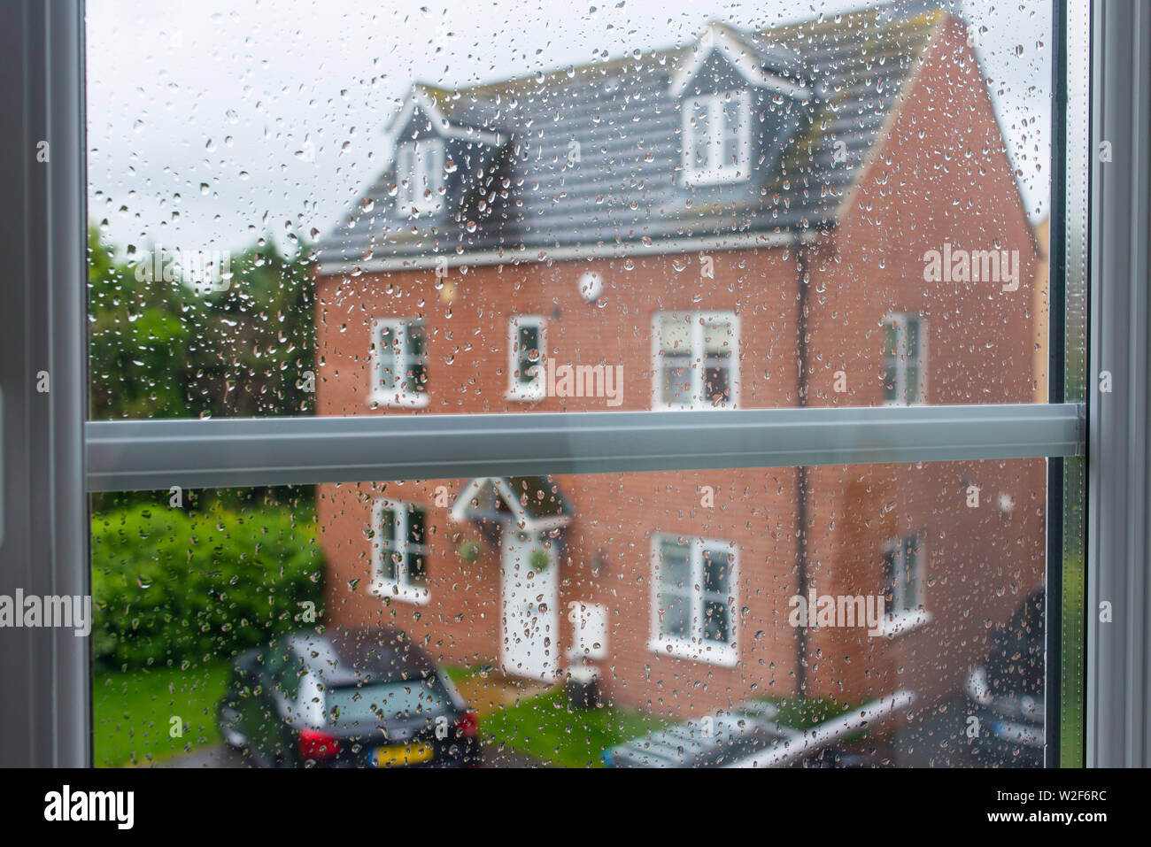 Rainy day window house hi-res stock photography and images - Alamy