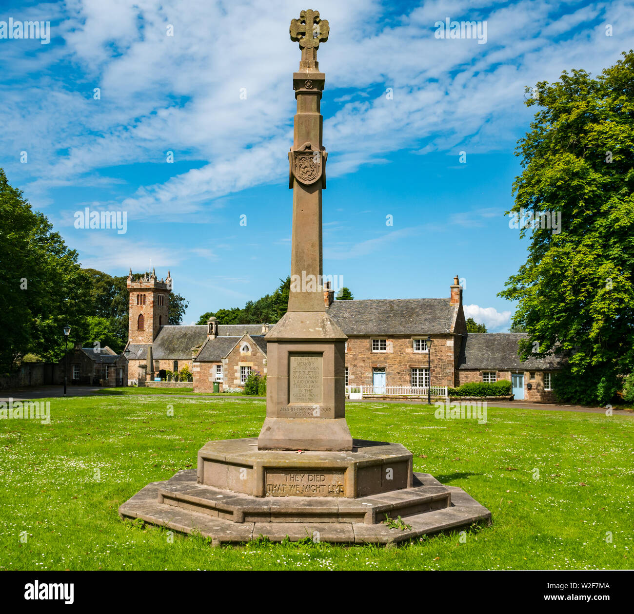 War memorial and Dirleton Parish Church on sunny Summer day, East Lothian, Scotland, Uk Stock Photo