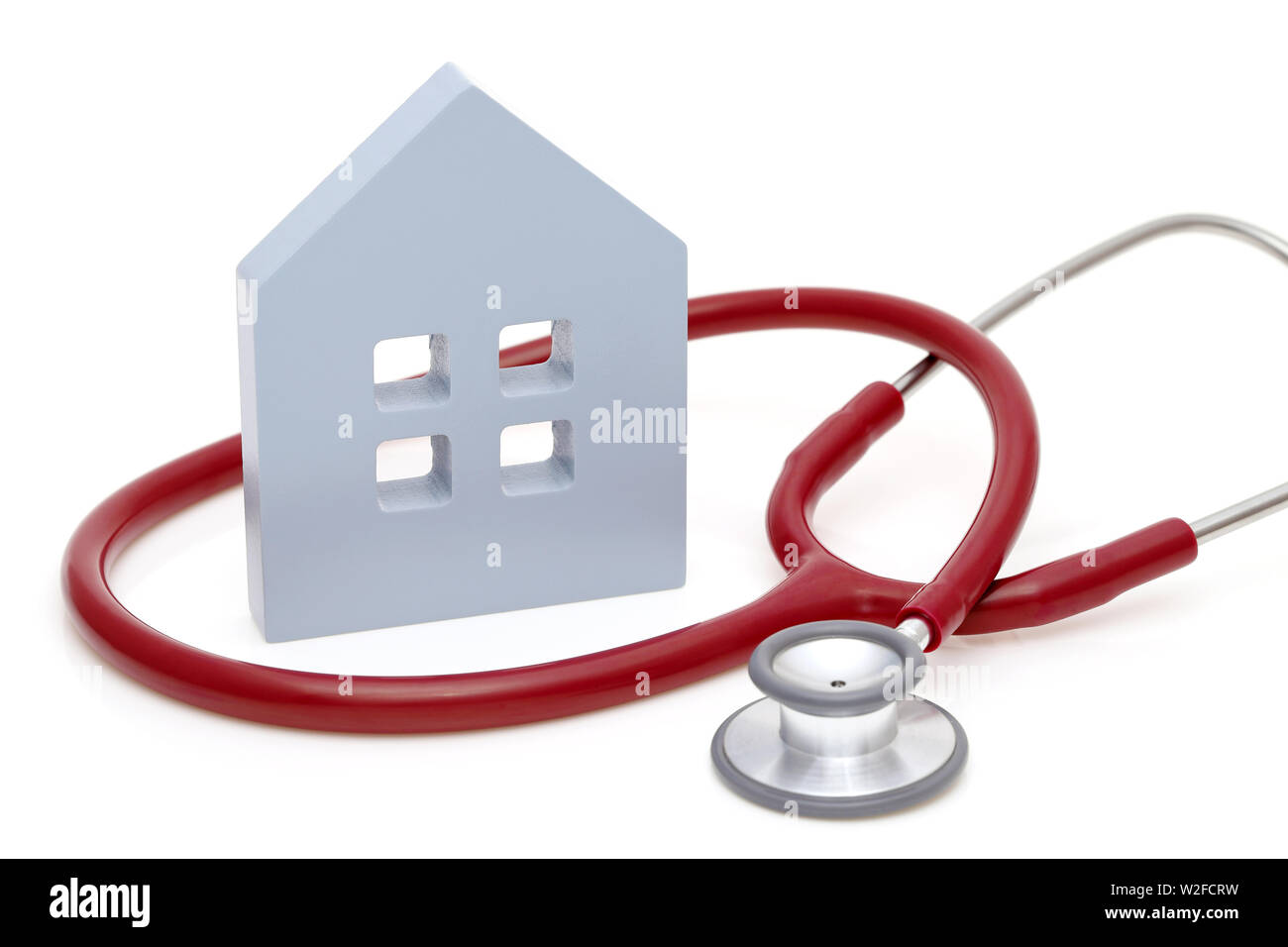 House diagnostics. Model house with stethoscope isolated on white background Stock Photo