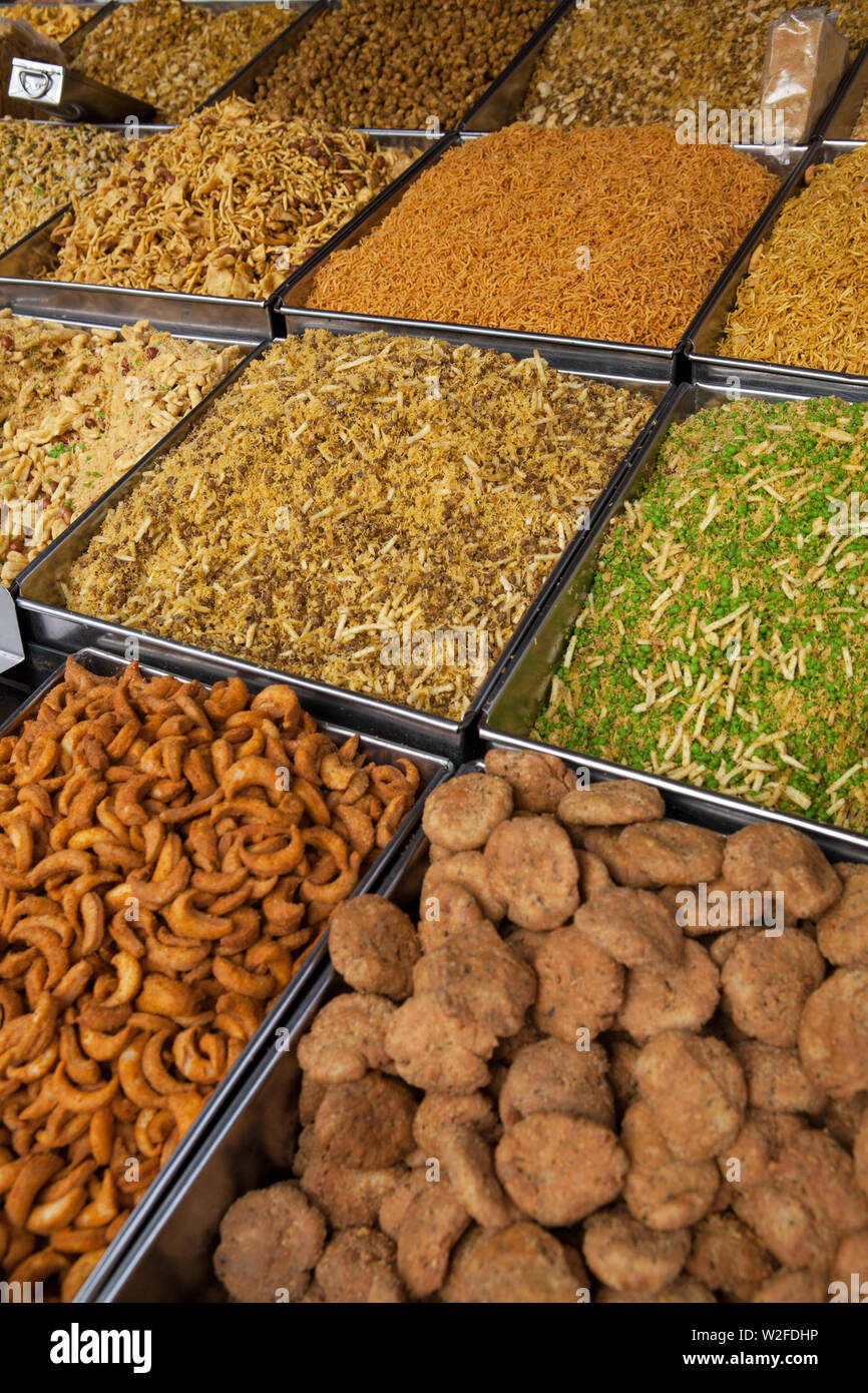 Display of namkeen and savoury snacks in the old city of Lucknow Stock