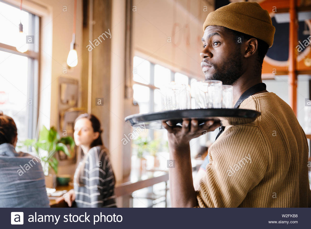 Restaurant waiter tray hi-res stock photography and images - Alamy