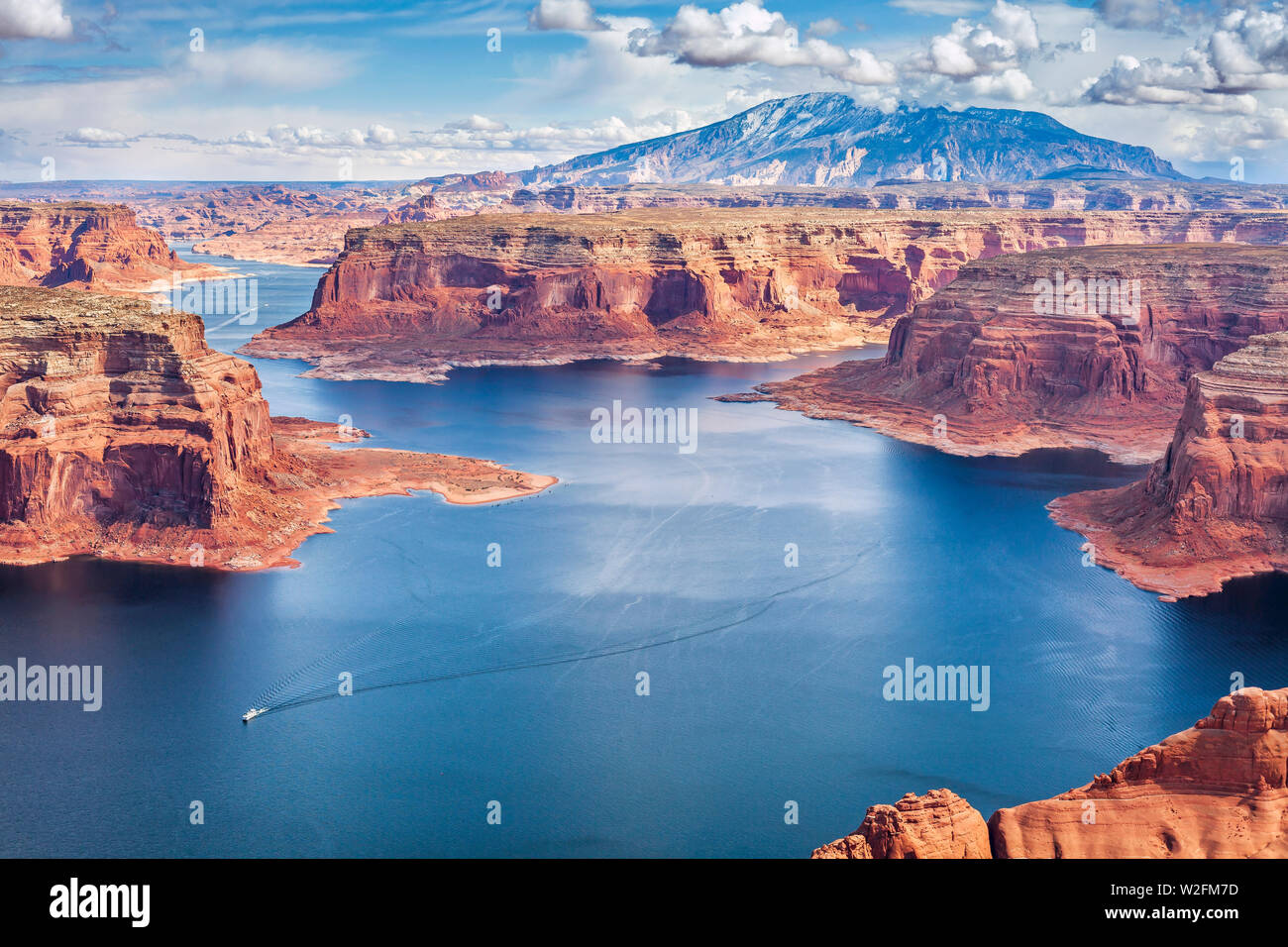 Houseboats on Lake Powell, Utah with Navajo Mountain in the background. Stock Photo