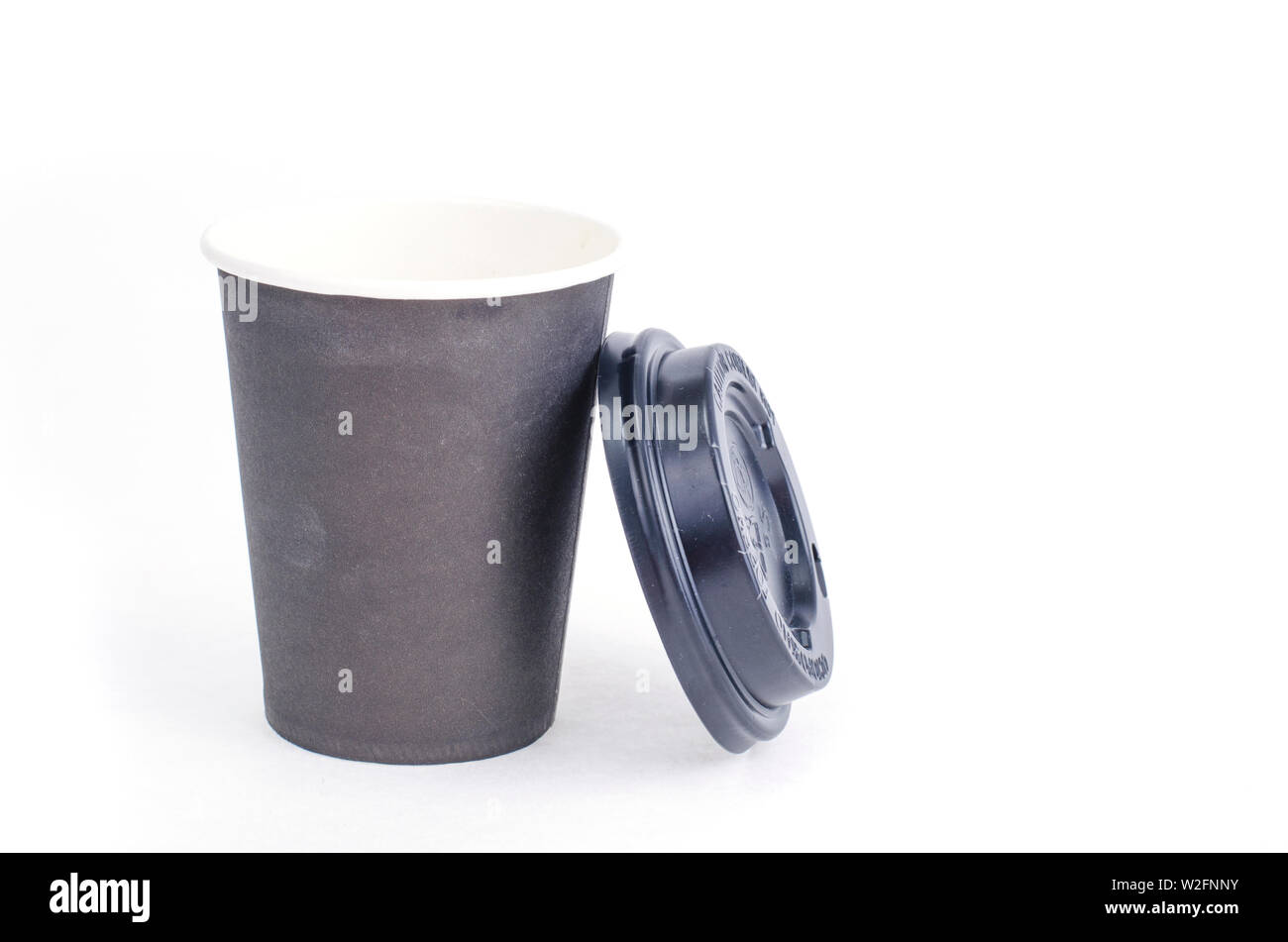 Disposable black paper cup for beverage Stock Photo - Alamy