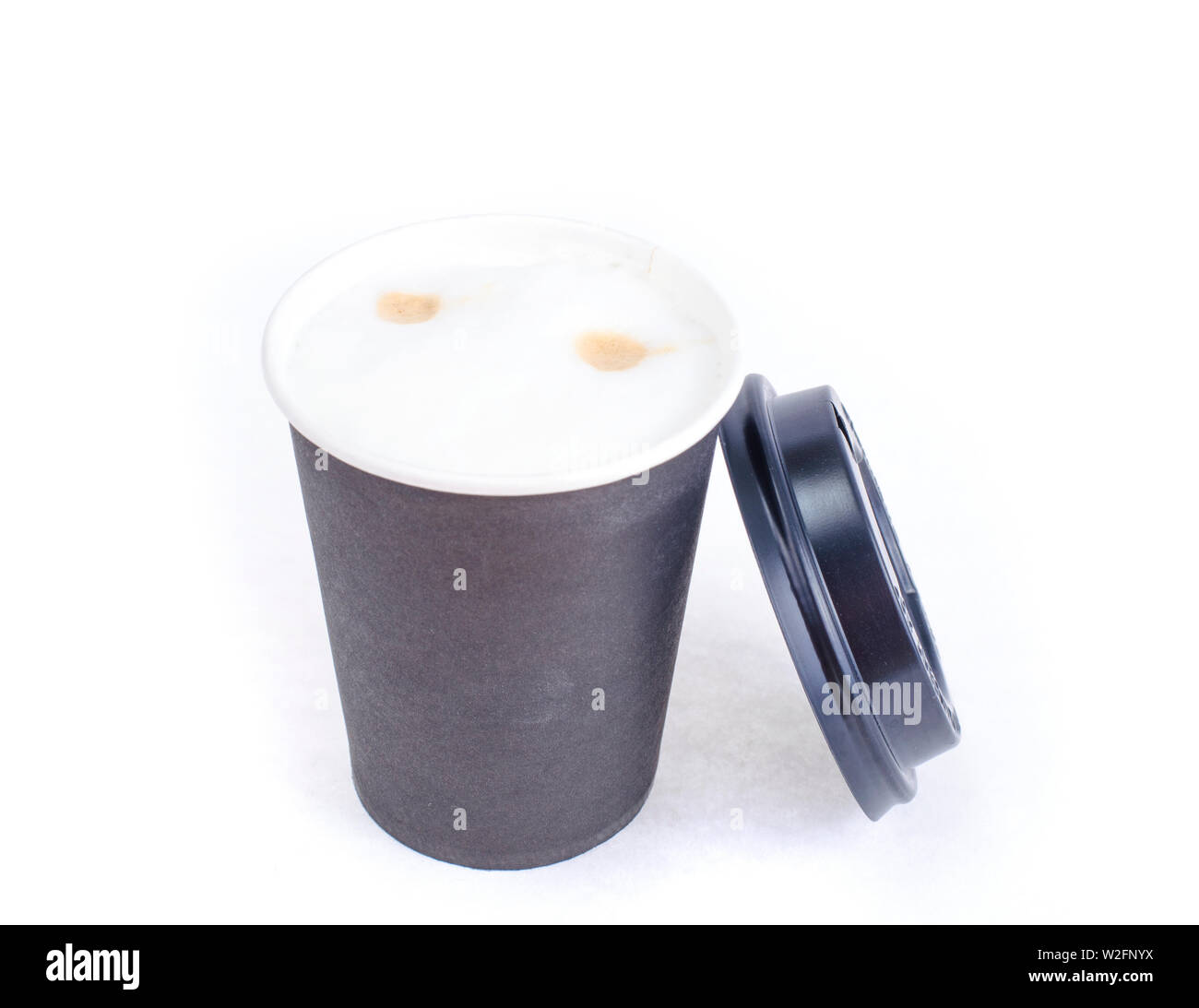 Disposable black paper cup with cappuccino, latte Stock Photo - Alamy