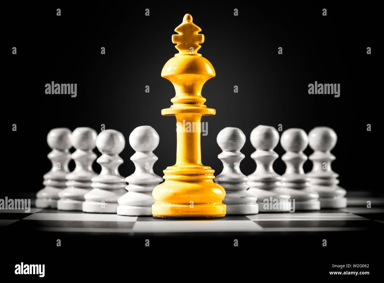 Premium Photo, Golden king chess is last standing in the chess board