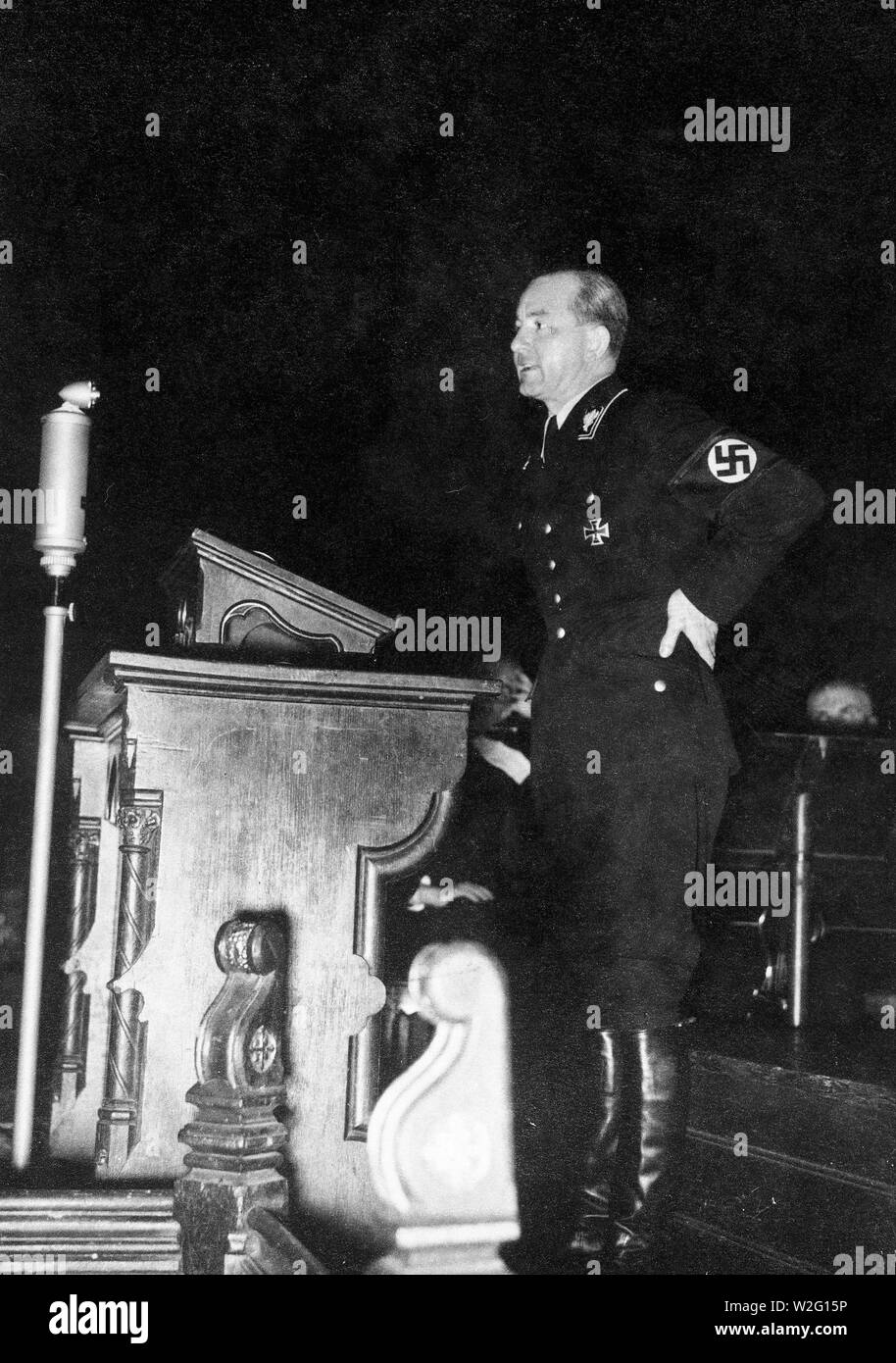 Eva Braun Collection (album 4) - Nazi officer standing at what appears to be a church lectern ca. late 1930s or early 1940s Stock Photo