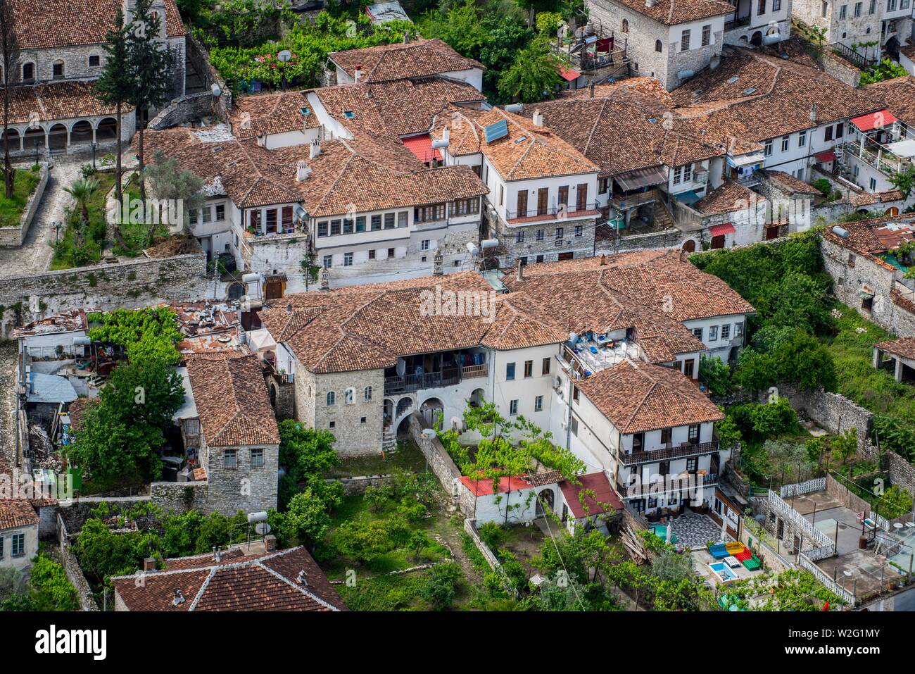 View on houses with old tiled roofs, district Gorica, Berat, Albania Stock Photo