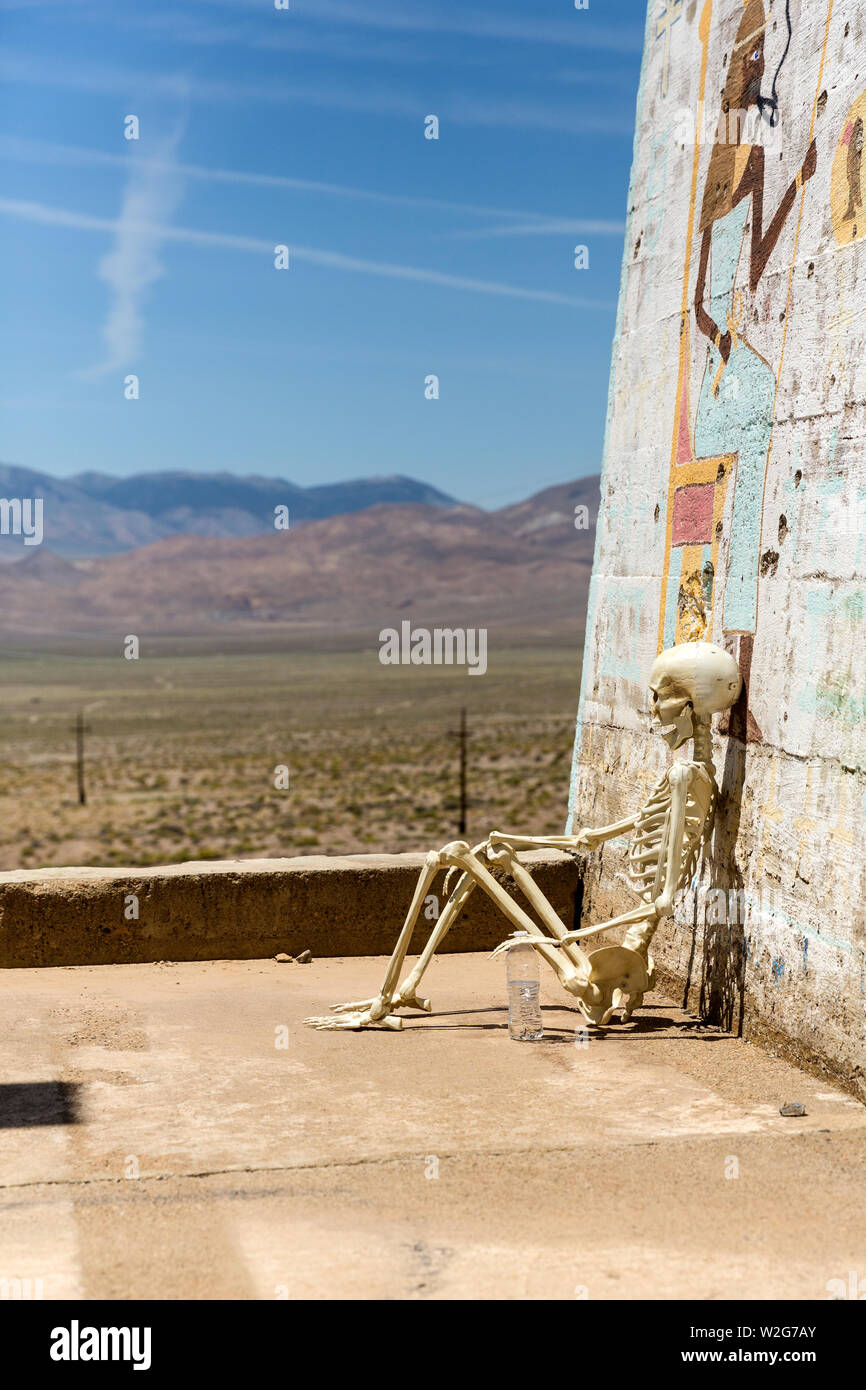 Skeleton hanging out at Ludwig mine Nevada ruins Stock Photo - Alamy